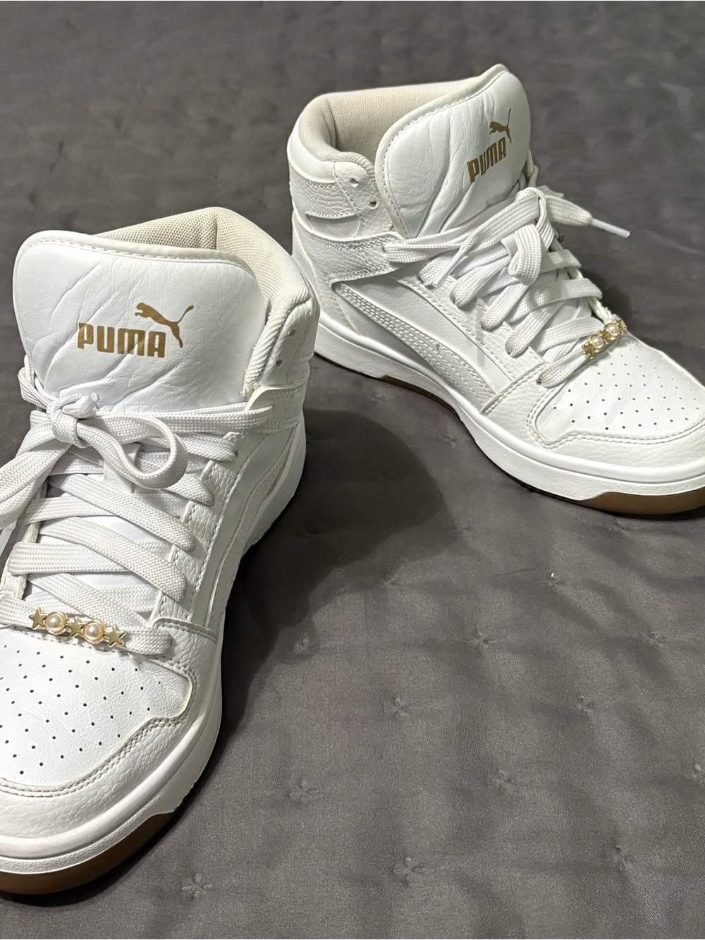 Puma Kid’s White High-Top Sneakers with Gold Logo Accents